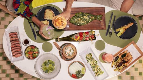 Sharing family-style dinner at luxury hotel