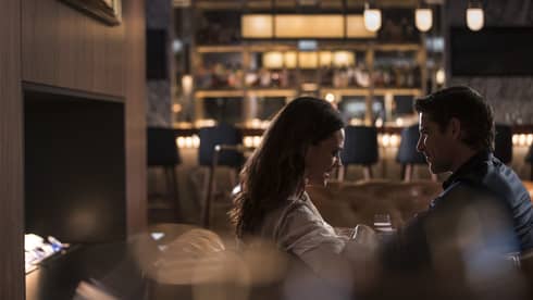 Couple on romantic date at dimly lit Bayou and Bottle lounge
