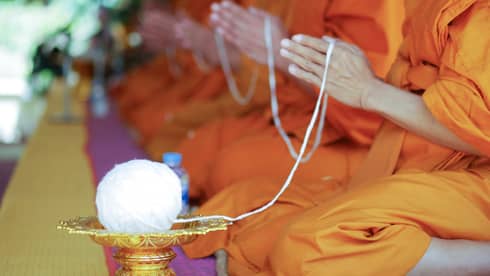 Monks sitting in prayer
