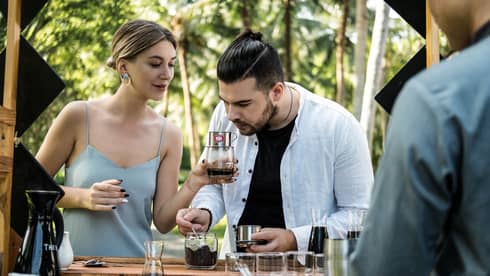 A couple participates in a coffee tasting session