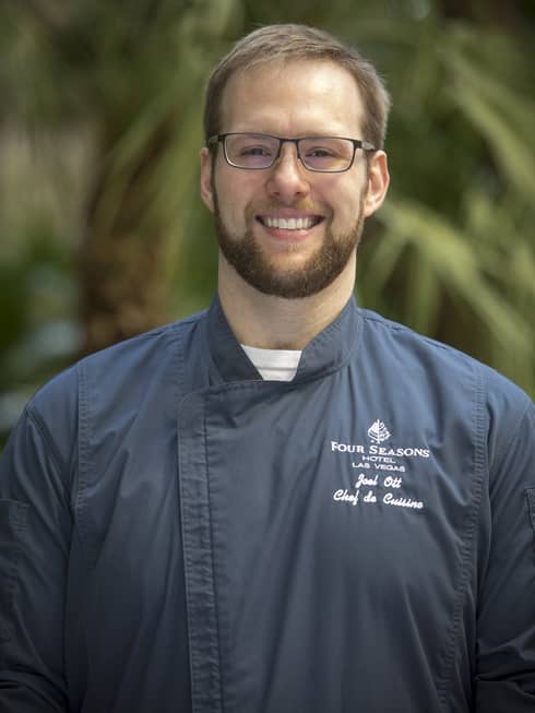 Portrait photo of Chef de Cuisine Joel Ott wearing uniform