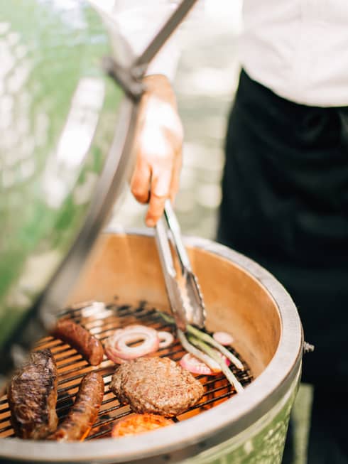 Food being grilled outside.
