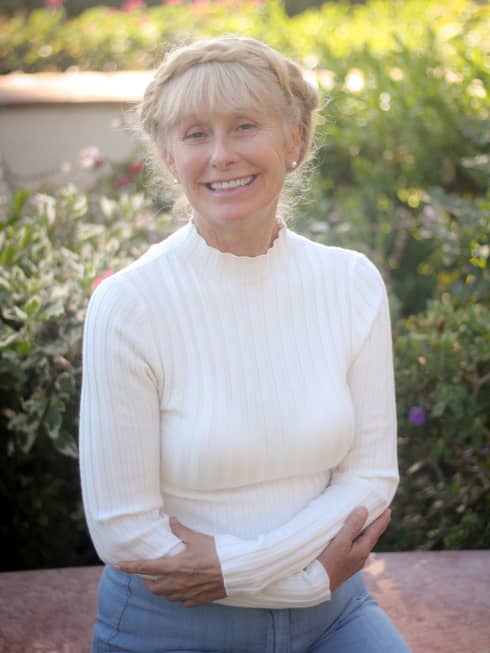 Portrait photo of smiling Massage Therapist and Yoga Instructor Chantal Evrard