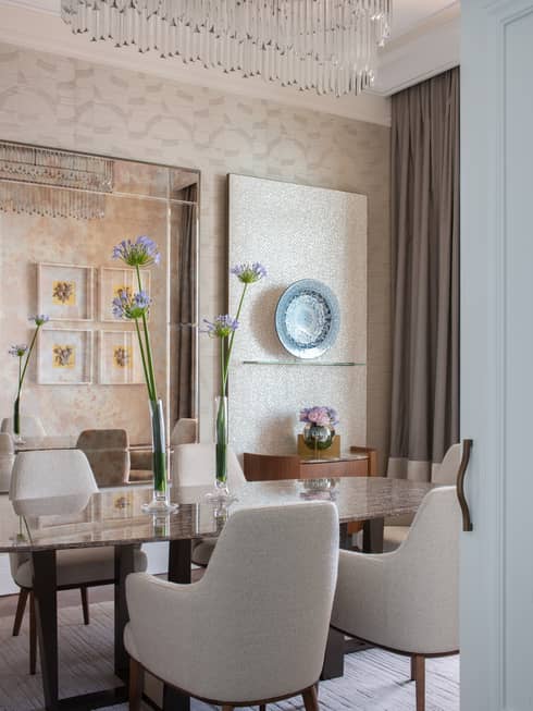 Royal Suite table and chairs with chandelier above