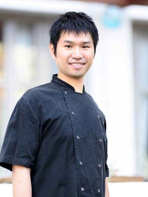 Portrait photo of Noe Chef de Cuisine Ryo Takatsuka wearing uniform