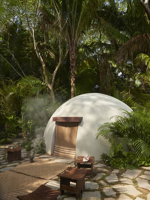 Traditional temazcal "house of heat" in jungle-like setting