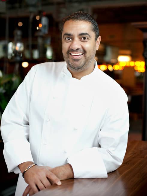 Portrait photo of Minas chef Michael Mina in uniform