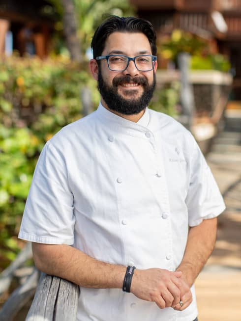 Portrait photo of Chef Kalani Garcia in unform