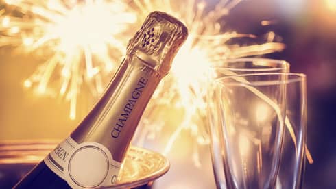 Fireworks, champagne and two champagne flutes