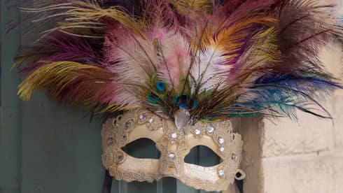 Colourful Mardi Gras mask with peacock feathers