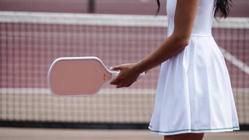 Woman playing pickleball