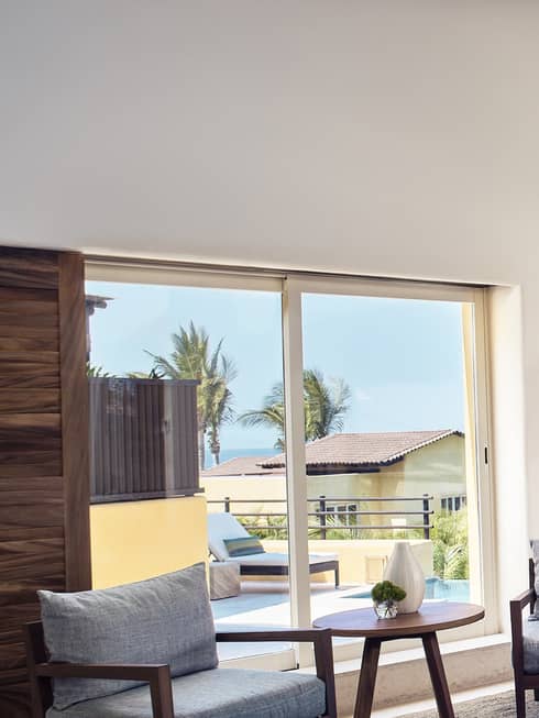 Four Bedroom Ocean View Villa living room by open wall to patio, ocean views