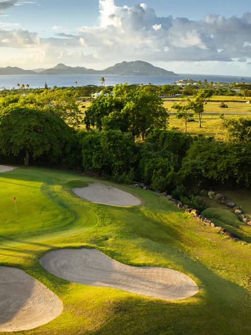 A golf course near the ocean.