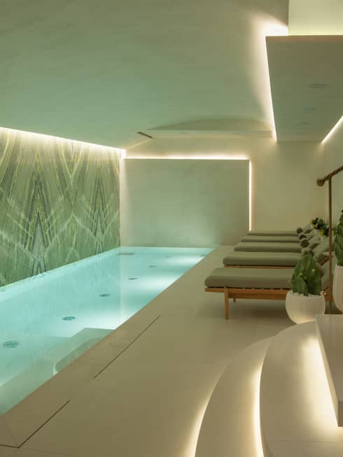 Spa pool area with lounge chairs