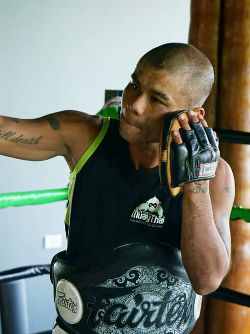 Resident Muay Thai expert, Anuphong Deesamer, leading a sparring session