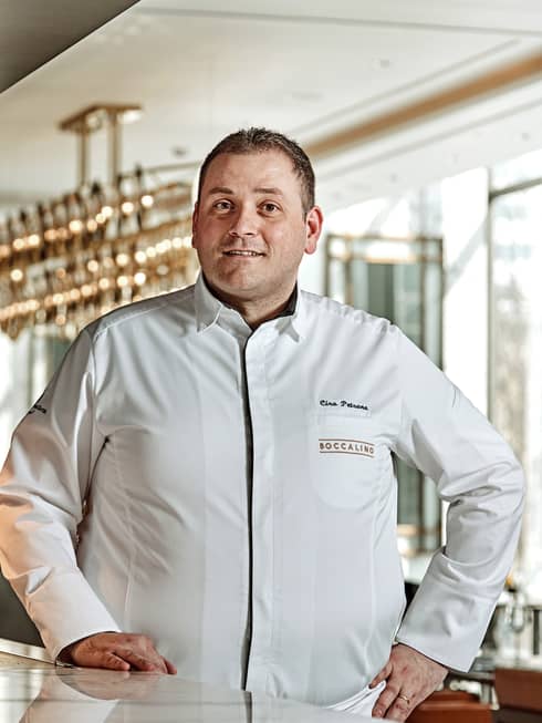 Portrait photo of Italian Chef, Boccalino Ciro Petrone wearing white uniform