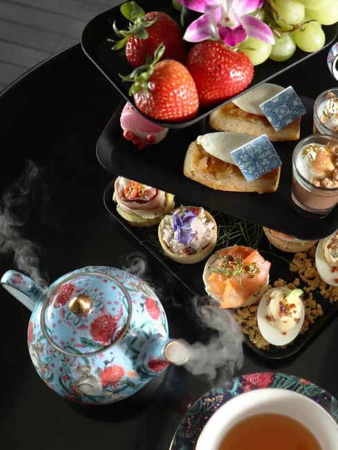 A colourful afternoon tea set.