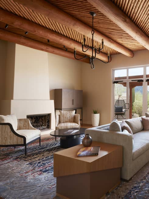 Prescott Suite seating areas under beam ceiling with small fan