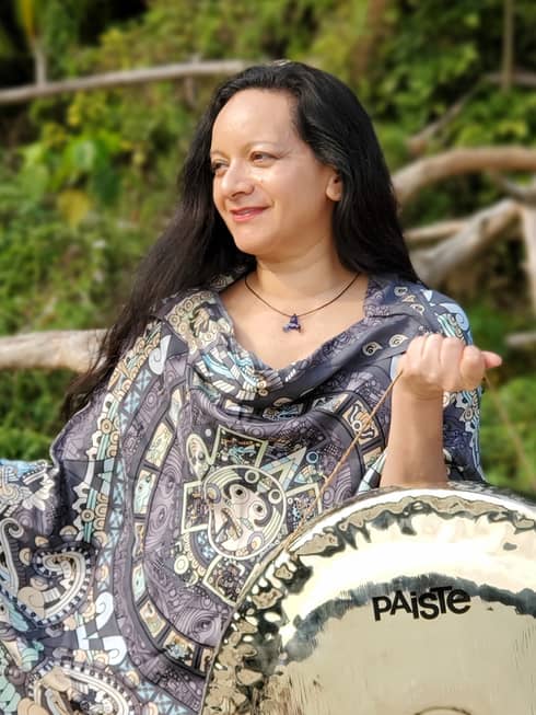 Portrait photo of Cheryl Rodriguez with steel drum