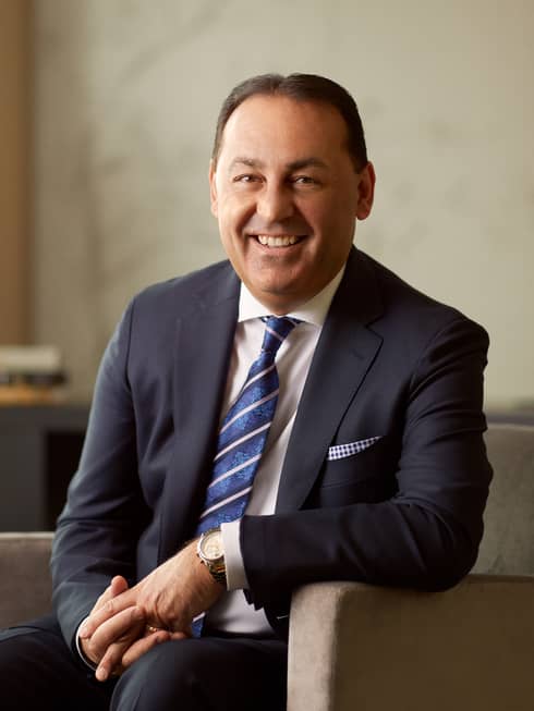 Portrait photo of Hotel Operations, America President Vince Parrotta wearing suit, tie