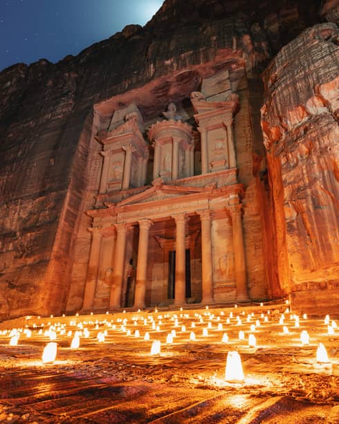 Lantern lit at night at treasury ancient architecture in canyon, Petra in Jordan