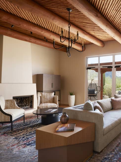 Prescott Suite seating areas under beam ceiling with small fan