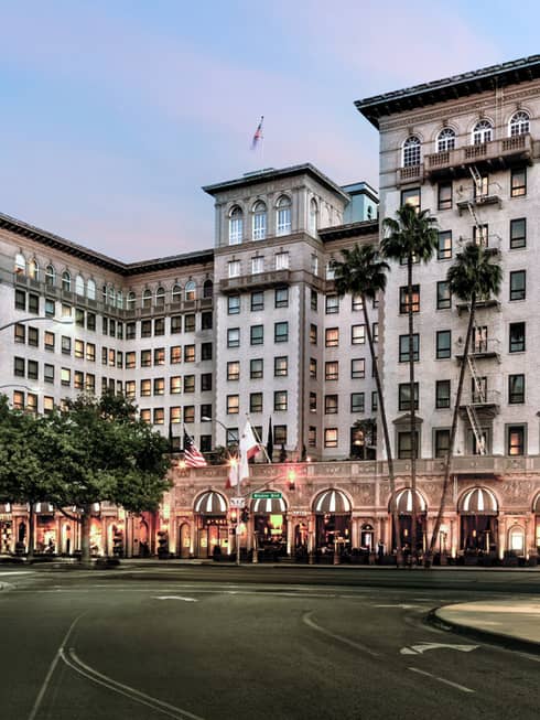 Four Seasons Hotel Beverly Wilshire building exterior, entrance at sunset