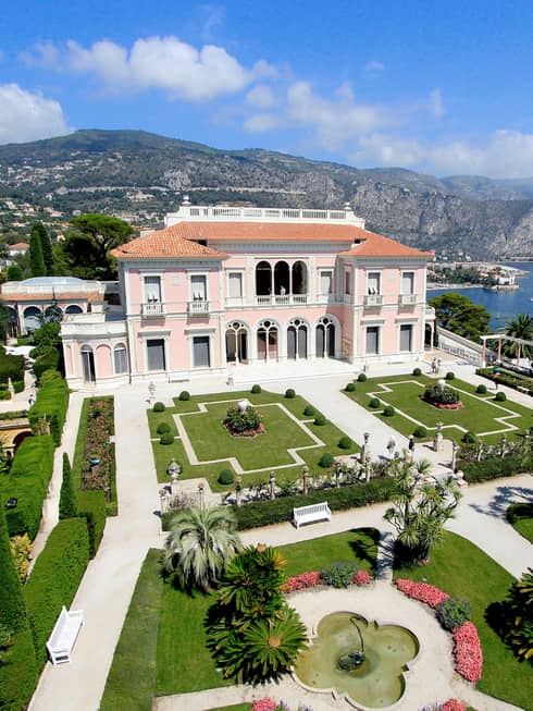 The Grand Hotel, overlooking the water with beautiful arches and pristine gardens