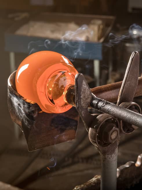 An artisan making Rucki Glass