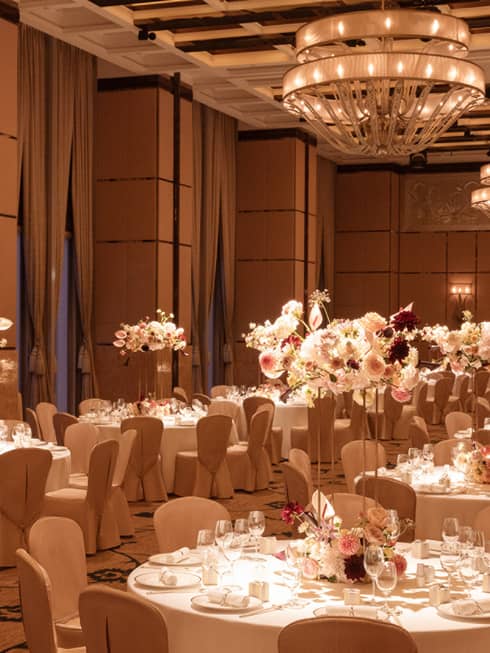 Grand indoor ballroom set for wedding