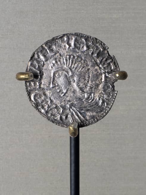 Silver penny artefact showing impression of Saxon King Aethelred II 