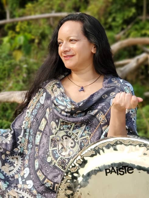 Portrait photo of Cheryl Rodriguez with steel drum