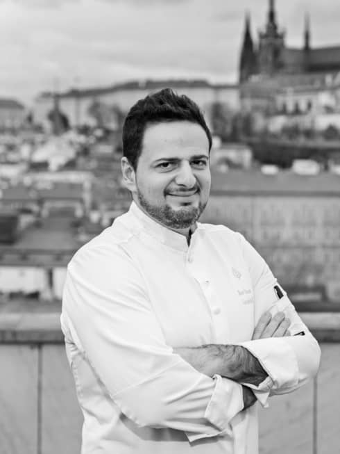 Chef Marco with Prague backdrop