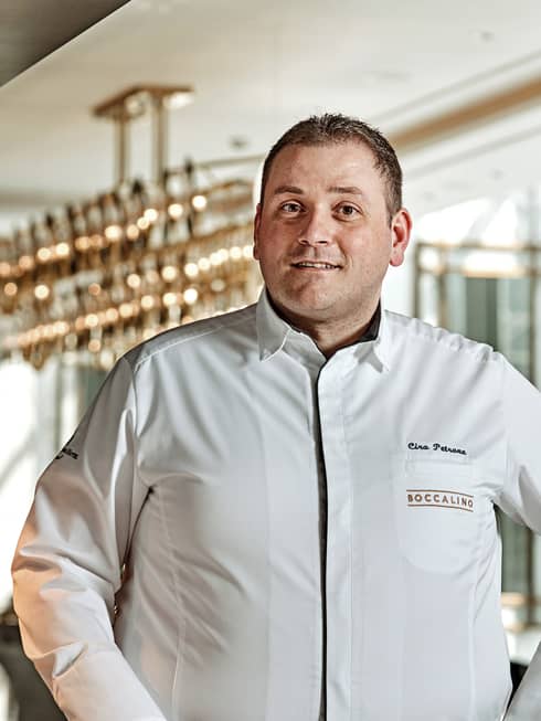 Portrait photo of Italian Chef, Boccalino Ciro Petrone wearing white uniform