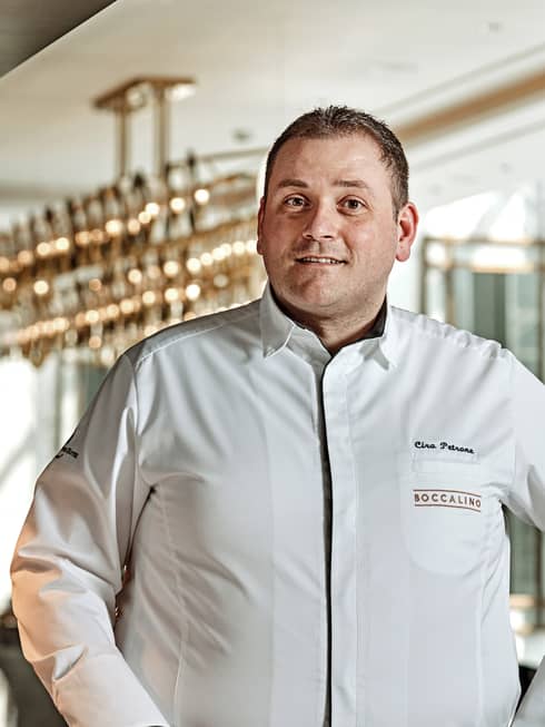 Portrait photo of Italian Chef, Boccalino Ciro Petrone wearing white uniform
