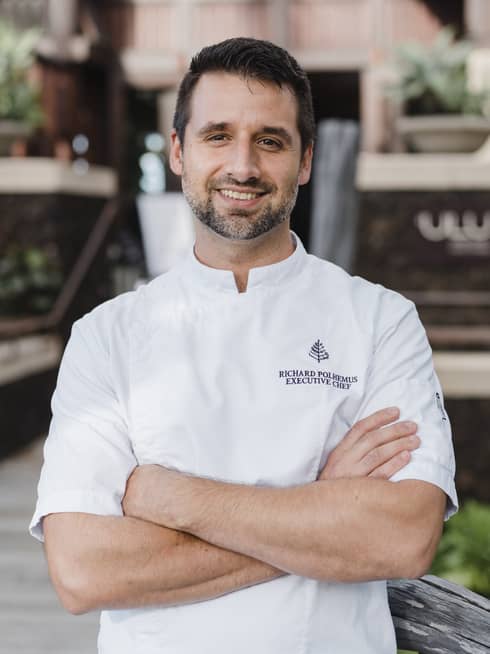 Portrait photo of Chef Richard Polhemus wearing uniform with arms crossed