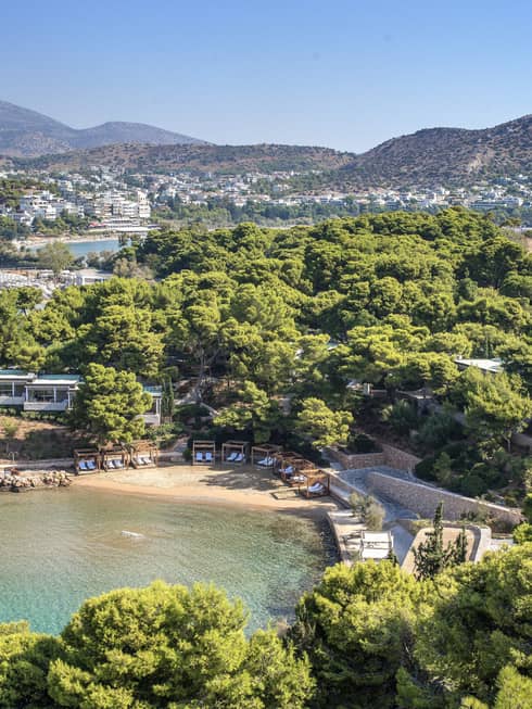 This image depicts our Hotel from above, the greenery and water that surrounds it and is connected to sustainability and ESG