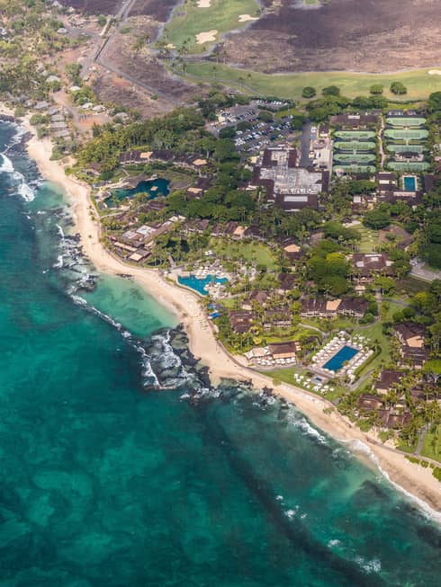 Aerial view of Four Seasons Resort Hualalai, beach and shoreline