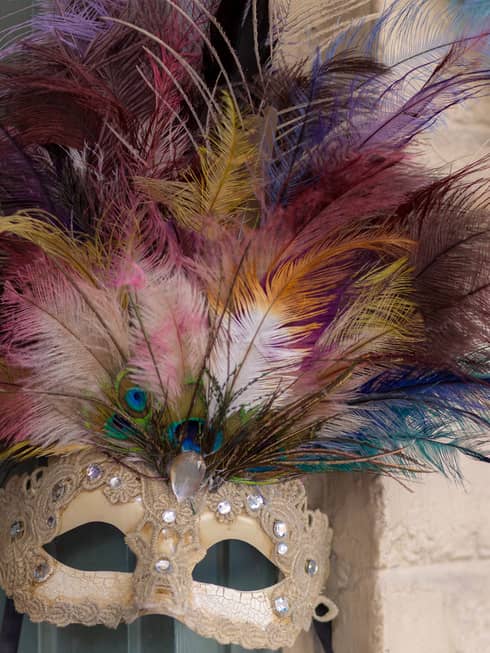 Colourful Mardi Gras mask with peacock feathers