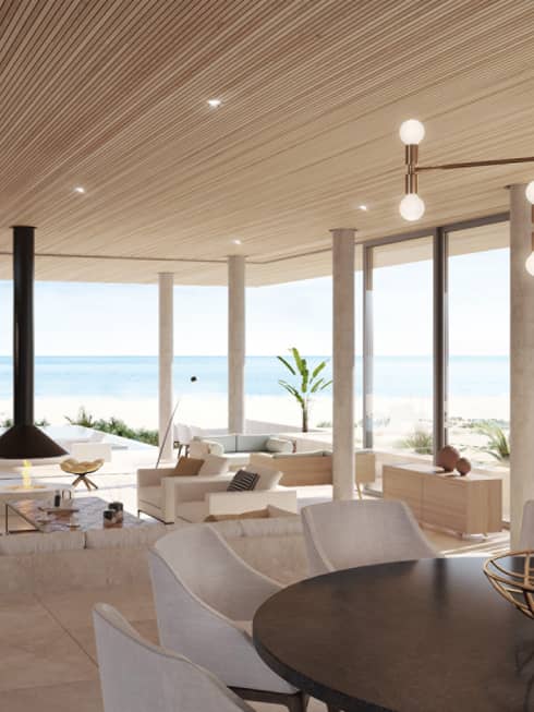 Bright, modern living room with tile floors, sunken living room, floor-to-ceiling windows overlooking beach