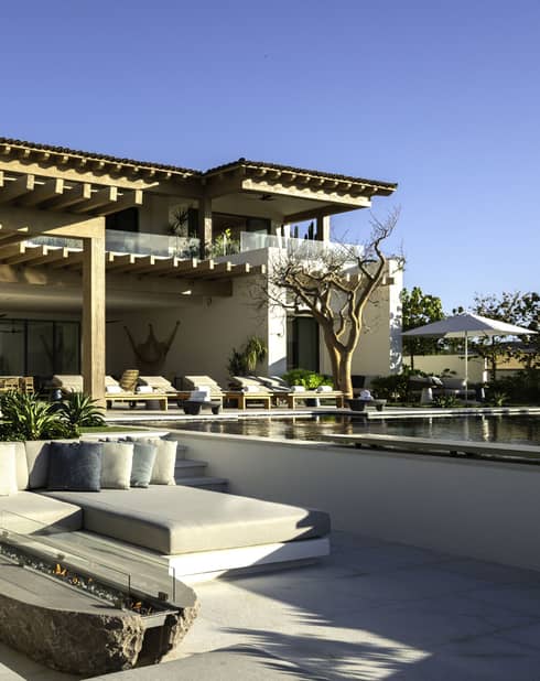 Large private villa with outdoor pergola and sunken fire pit lounge area 
