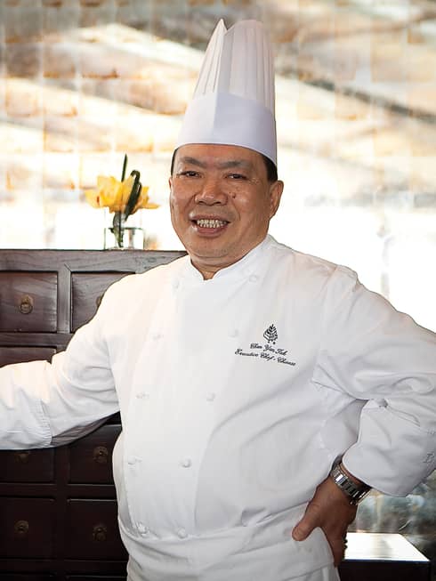 Portrait photo of Executive Chinese Chef Chan Yan Tak in white uniform