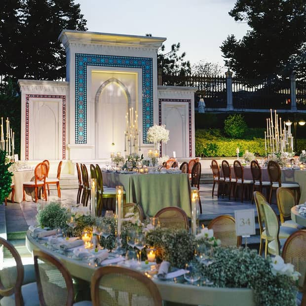 wedding table setting with sage green decorations
