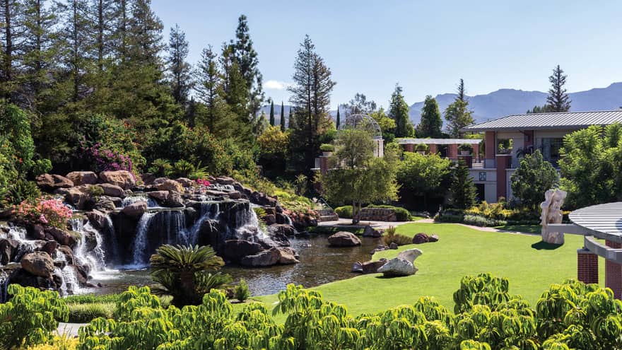 Waterfalls over rocks, boulders in garden at Four Seasons Hotel Westlake Village
