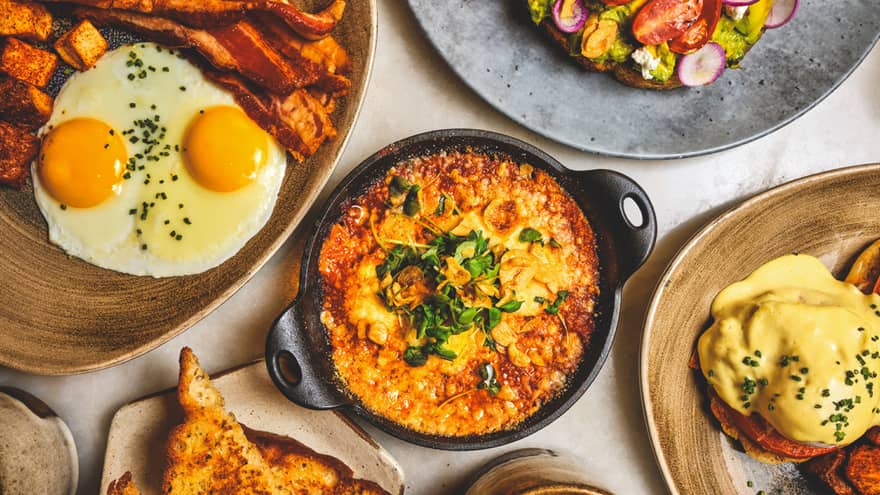 A variety of brunch dishes arranged on a table