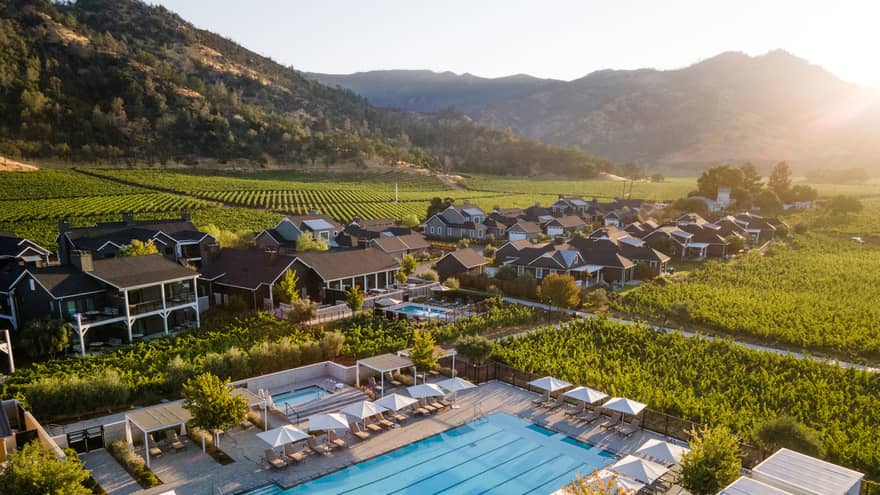 Aerial view of lap pool with surrounding cabanas at Four Seasons Resort and Residences Napa Valley