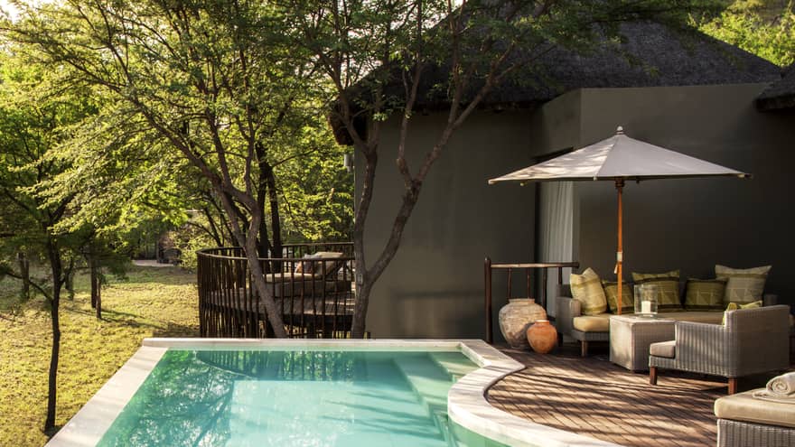 Two-bedroom villa plunge pool, curved patio with umbrella