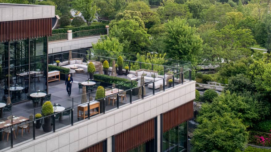 Exterior shot of elevated outdoor terrace restaurant at Four Seasons Hotel Suzhou