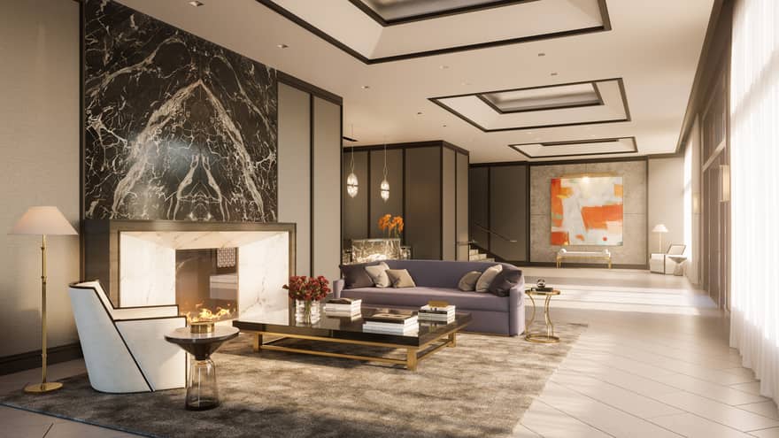 Lobby sitting area with marble fire place, purple sofa, and white arm chair