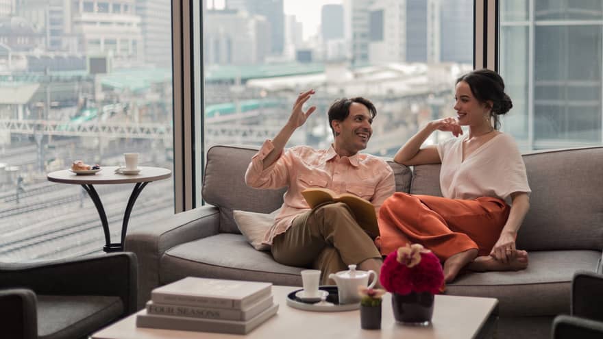 Luxury suite stay at Four Seasons Hotel Tokyo at Marunouchi with panoramic views of Tokyo Station skyline.
